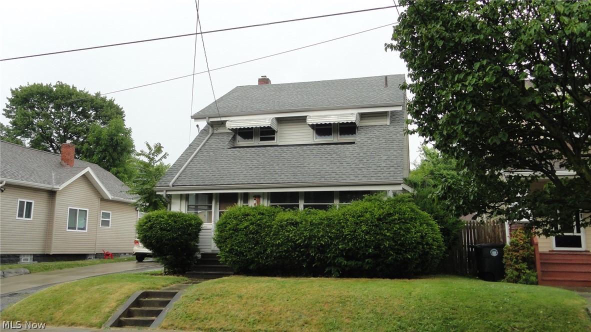 Here's a solid home in a nice area that has a  newer roof, electric and furnace but it needs some repairs and a total cosmetic renovation. It's a great floor plan with a large formal living room with fireplace,an eat in kitchen, a formal dining room, a large enclosed front porch plus a first floor bedroom and a first floor full bath! The second floor has three more bedrooms and a second full bath. Full basement and a 2 car garage. With the needed updates, it will be a nice home for the next family to enjoy.