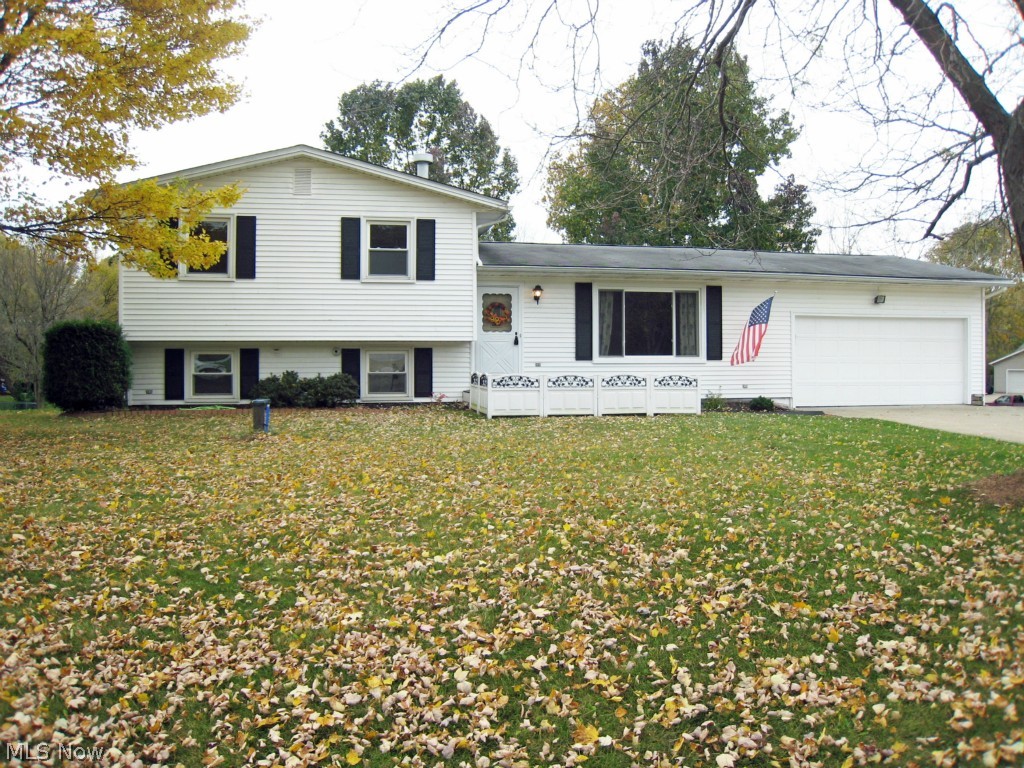 Don't miss your opportunity! This 3 bedroom, 2 full bath home is move in ready! Tired of parking outside? You'll love the 2 car attached car! All bedrooms are on the upper level with a full bath that has a door to the hallway and a door to the master bedroom.  Each of the rooms have spacious closets. Large living room, dining room, and kitchen on the main floor. The lower level features a large family room with another full bathroom and bright laundry/utility room with full height windows. The backyard features a large deck and has a very spacious & private view. New well in 2014. Newer water heater, windows and electrical service.  The home is priced well and won't stay on the market long, so schedule your showing today!