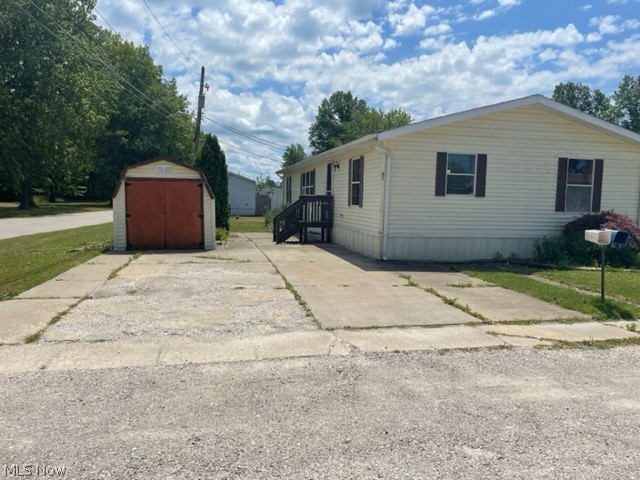 This spacious 1989 double wide has 3 bedrooms and 2 full bathrooms. Master bedroom with newly remodeled master bath and a walk in closet.  Nice open kitchen with skylight for tons of natural light and a breakfast/bar seating area that opens up into the large dining room. Large laundry/utility room with extra storage space. Great location close to the 'strip' at GOTL and the shores of Lake Erie. Call to schedule your showing today!!