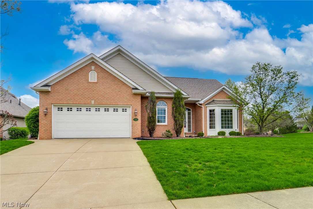 We're so excited to bring you this beautiful home! The Villas of St. James provides an exceptional community of free-standing villas that has become a coveted neighborhood in the area. Beautiful hardwood makes quite a statement as it stretches from the entry to the dining room, kitchen, and the great room. The eat-in kitchen is perfectly placed between the dinette and formal dining room and shows off recessed lighting, a kitchen peninsula with seating, a pantry with roll-out shelving, and quartz counters. The great room features vaulted ceilings and an additional sitting area. At the front of the home, enjoy the front living room or a potential office/den. Down the hall, retreat to the owner's suite with a large cabinet. The owner's bath offers a jetted tub, a tile shower, and a walk-in closet. The secondary bedroom is served by the hall full bath. The ease of living is enhanced by the first-floor laundry with a wash-out sink. When you include the partially finished lower level, the home provides over 3200 square feet of living space. It comes with a large rec room plus two bonus rooms that can be used as a potential third and fourth bedroom. Plus, an additional full bath. Believe it or not, spending time outside will soon be here, and this home does not disappoint with a back deck and a sunroom with tons of windows to enjoy the quiet neighborhood. Plus, the home comes with a generator and updated AC/furnace, which were replaced in 2023. The home overflows with details, accents, and touches that you are sure to appreciate. It truly stands out; schedule your showing today!