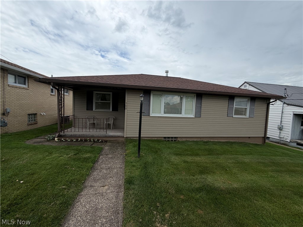 Welcome to this beautiful, meticulously maintained ranch home located right in the heart of Weirton! This inviting 3 bedroom, 2 bath residence features a spacious and practical floor plan with tons of storage! The kitchen is fully equipped with a specialty flat-surface electrical range and the like-new specifically designed cookware comes with it. The Pella windows throughout the home enhance energy efficiency while allowing abundant natural light to shine through. The finished lower level significantly expands the living space and includes a large recreation and entertainment area, a bonus room that could possibly be turned into an additional bedroom, office, or playroom. You will also find a fruit cellar with built-in shelving, multiple oversized closets, an additional bathroom, and a stair lift providing added convenience and accessibility. The heated attached garage is a rare bonus, featuring hot and cold water to wash your cars, built in cabinetry, a workbench, two garage doors, numerous electrical outlets, and a 200-amp electrical service-perfect for hobbyists, projects, or additional workspace. Outdoor amenities include a covered front porch to enjoy your morning coffee, side porch off the kitchen, beautifully maintained lawn with curb appeal, and automatic dusk-to-dawn pole lighting in both the front and rear yards. Additional highlights include gas heat, Central Air, and several personal property items that will remain with the home including the entertainment center and grandfather clock. Pride of ownership is evident throughout this move-in-ready home! 
Conveniently located near a hospital, shopping, and many restaurants! Call for your private showing today!