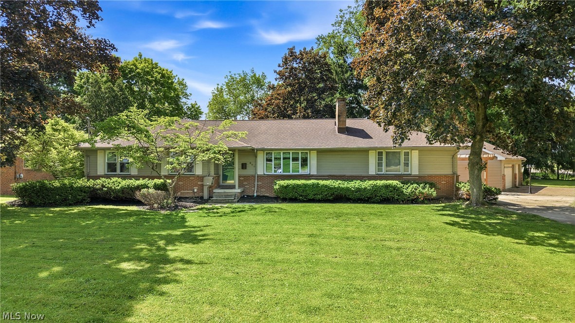 "Updated Liberty Ranch with Finished Lower Leve & 5-Car Garage Capacity!"
Welcome home to this beautifully updated ranch in the heart of Liberty Township, offering over 3,000 square feet of finished living space and an incredible combination of comfort, versatility, and convenience. Ideally located near the shopping, dining, grocery stores, and schools, this move-in-ready home has so much to offer.

Step inside to a spacious and inviting living room that flows seamlessly into a generous dining area, creating the perfect space for entertaining family and friends. The updated kitchen features custom cabinetry and abundant workspace, while the conveniently located main-floor laundry room adds everyday functionality.

A second expansive living area with a fireplace provides endless possibilities and can serve as a family room, den, media room, or an additional living suite. 

An enclosed porch off the laundry area offers additional versatile space ideal for a mudroom, sunroom, sitting area, or hobby room.

The partial finished lower level significantly expands the home's living space, featuring a large recreation room perfect for entertaining, movie nights, gaming, or gatherings. You'll also find an additional bedroom, bonus room, exercise area, and ample storage space. The lower-level leads to an enclosed rear patio with tremendous potential to become a beautiful extension of the home's living and entertaining areas.

Outside, you'll appreciate the rare combination of an attached 5 - Car Garage offering exceptional space for vehicles, hobbies, equipment, or workshop needs.

Offering exceptional space, flexibility, and garage capacity rarely found in today's market, this beautifully maintained home is ready for its next owner.