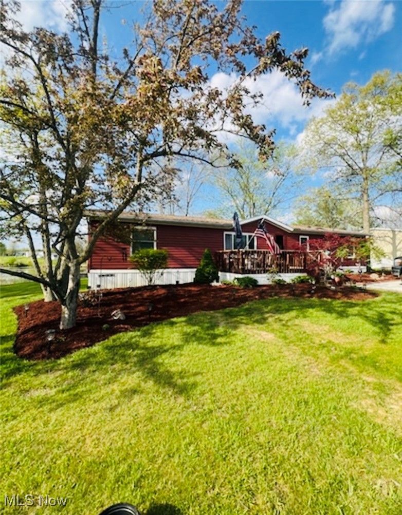This charming 3-bedroom, 2-bathroom home offers the perfect blend of comfort and tranquility, with a stunning view of the lake. Step inside to a spacious living area filled with natural light, creating a warm and inviting atmosphere in both the formal dining room and family room.The modern kitchen boasts stainless steel appliances, ample counter space, and a breakfast bar, making it a chef's dream. Enjoy peace of mind with newer upgrades including A/C, windows, roof, and siding, along with a concrete driveway.
The master suite features a walk-in closet and an en-suite bathroom. Two additional bedrooms provide plenty of space for family or guests. The updated bathroom features modern fixtures and finishes. Newer floors and fresh paint throughout the home add a touch of elegance. Window treatments and all appliances stay! Outside, the expansive backyard is an oasis of relaxation, with a lush landscape, mature trees, and a patio perfect for outdoor dining and entertaining. Located just a short drive from local amenities, schools, and parks, this home offers both convenience and privacy. Don't miss the opportunity to make this your forever home!"