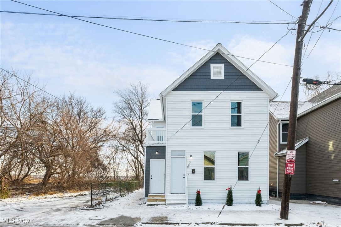 Incredible Opportunity in the Heart of Tremont! Don’t miss this fully renovated two-family home, ideally located near Tremont, Ohio City, and all the attractions of Downtown Cleveland. Whether you’re looking to live in one unit while renting the other or expand your investment portfolio, this property checks every box. Each unit offers a bright and spacious living room that seamlessly flows into a modern kitchen, complete with sleek white cabinets accented by black hardware, granite countertops, and stainless steel appliances—all included. The first-floor unit features an owner's bedroom with a closet, a second versatile room perfect as a second bedroom or office, and a beautifully updated bathroom with a double-sink vanity, ample storage, a walk-in shower, and stylish black hardware. The second-floor unit includes a cozy bedroom and an equally stunning bathroom with the same luxurious features. Both units come with a stackable washer and dryer for added convenience. The lower level provides plenty of storage space. Recent updates include brand-new windows (including a glass block in the basement), all-new electrical systems with updated wiring, panels, outlets, and lighting, and completely updated plumbing with new supply and waste lines. The home also boasts new drywall, flooring, and soft-close kitchen cabinets with granite countertops and stainless steel appliances. Bathrooms have been updated with tiled showers, glass surrounds, and double vanities. Exterior improvements include fresh paint, partial new vinyl shake siding, and new HVAC systems with updated ductwork 2024. This home is truly move-in ready—just turn the key and make it yours! Don’t wait—call us today to schedule your private showing! The owner is a licensed agent in the state of Ohio