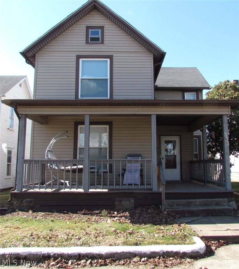 Thoughtfully remodeled 3BR/1BA home in the heart of Coshocton. Relax on the large covered front porch, cook and entertain in the beautifully updated kitchen, and refresh in the stylish, modern bath. First-floor laundry adds convenience, and luxury vinyl plank flooring adds a touch of durability and elegance. The spacious backyard with a shed offers room for gardening, play, or outdoor gatherings. Centrally located near shopping, dining, and local amenities—welcoming to a variety of financing options.