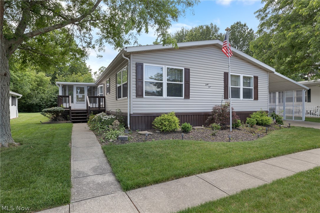 COLUMBIA Park IS A 55 AND OLDER CONCEPT OF LIVING and is Ohio’s Premier Adult Land Lease Community! Amenities Include: Gated entrance! On site Shopping Plaza! On site Management! Walking Path/Dog Walking Path! Shuffleboard! Bocce Ball! Library! Crafts, and Social Hall!  WELCOME HOME to this 1998 Schult Doublewide Manufactured Home offering 1848 sqft. (62 x 28) featuring 3 Bedrooms, 2 Full Baths, Formal Living and Dining Room, Family Room, Kitchen with Morning Room, Laundry and a Three Season Sunroom on the same level, no step down... measuring 20 x 10 giving you an additional 200 sqft.  All in all, you have over 2000 sqft. three seasons of the year.... If you are contemplating downsizing but you're not ready to part with your treasures, no worries there's plenty of room!!!!This home has been very nicely maintained.  Many upgrades but unsure of dates.  This home sets on a beautiful lot with lots of green space and beautiful trees on a great street.  Olmsted Township and Olmsted Falls are two very quaint suburbs sharing the same post office, and experiencing the exciting downtown where the Grand Pacific Junction is located for your entertainment, shopping and fine dining.  Columbia Park is close to highways and all types of shopping.  It's worth your time to come and take a look for yourself so you can be a part of this wonderful community.....