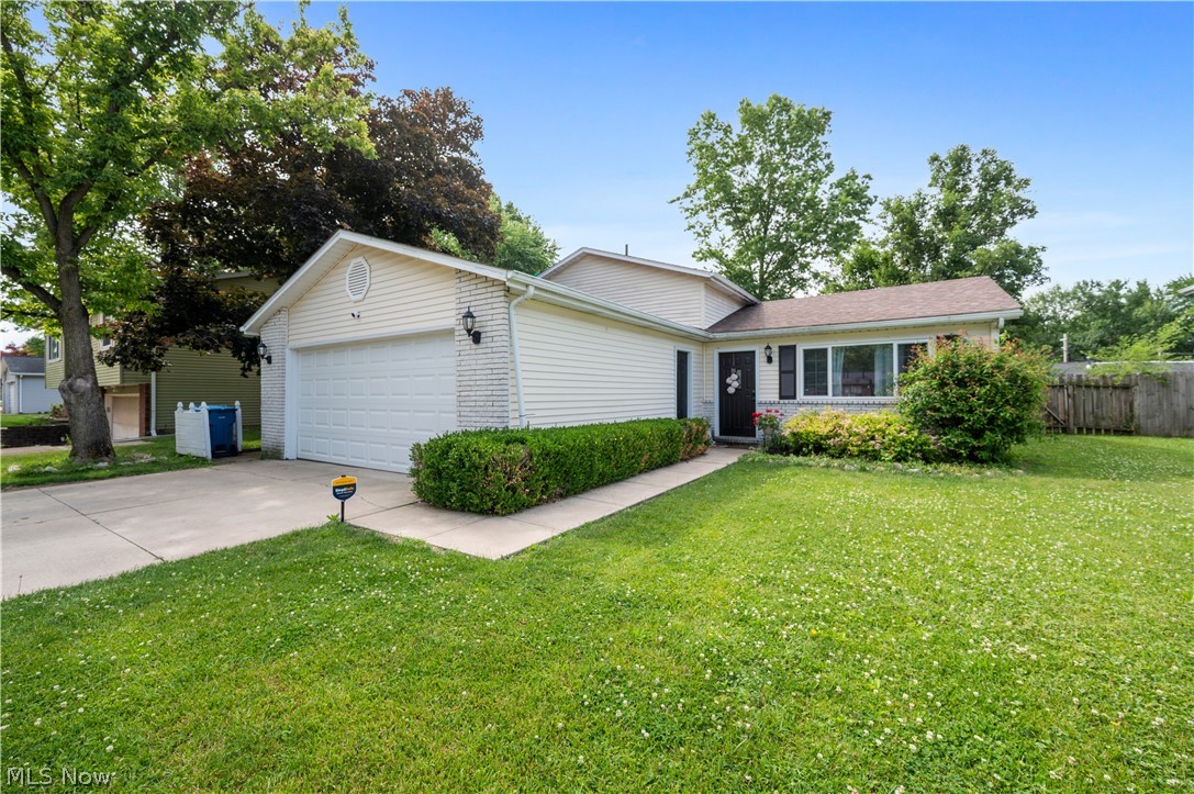 Welcome to this well maintained 4-bedroom split level home! Offering Comfort, Style, and a Functional layout. Step inside to find a spacious open kitchen including stainless appliances! The versatile floorplan includes 3 bedrooms upstairs and 1 bedroom on the lower level. The lower level, with just a few steps down, also includes a half bath and laundry room for added convenience. The privacy of the fully fenced yard complete with pergola makes it perfect for relaxing or entertaining! Central air was just added in 2024 for your comfort! This home is move in ready! Settle in and enjoy! Schedule your showing today!