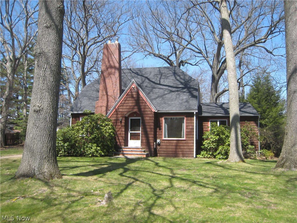 This is a 4 bedroom 2 full bath cape on a private street. The lot is 1.02 acres. There is a 2 car garage a with a workshop area. The master bedroom is on the main level and has a full bath. The master bedroom also has a sliding door to the deck. The large living room has a bright picture window, hardwood floors and wood burning fireplace. The eat in kitchen has ceramic tile and newer cabinets. There are 2 bedrooms upstairs and a full bath. The roof is new as of April 2016. The home has a well and septic. The water and sewer are at the end of the driveway.