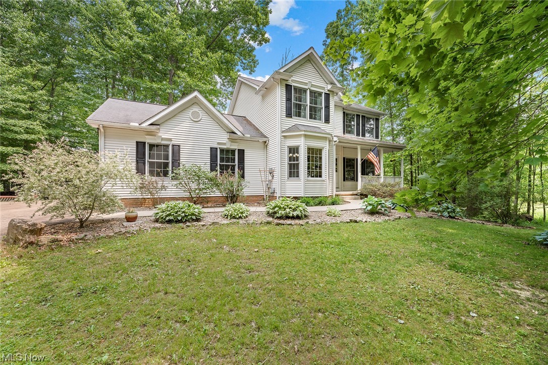 Welcome home to this beautiful newer Colonial situated on a private lot in Atwater! Inviting front porch leads to the airy vaulted foyer.  This home is built for modern entertaining with an open floor plan feel and high ceilings throughout.  Formal dining room to the left and spacious great room with a fireplace to the right.  The well appointed eat in kitchen offers plenty of counter space and opens to the great room and to the spacious deck out back. First floor comes complete with a half bath and first floor laundry/mudroom off the attached 2 car garage. Upstairs you'll find a spacious master bedroom suite with large walk in closet as well as bright and sunny master bath with great counter space, garden tub and separate shower.  2 additional bedrooms and a full bath complete the second floor.  Tucked away off the street, outdoors offers privacy with both open spaces and mature trees.  The lower level has tall ceilings and full sized windows providing an opportunity for a 4th bedroom