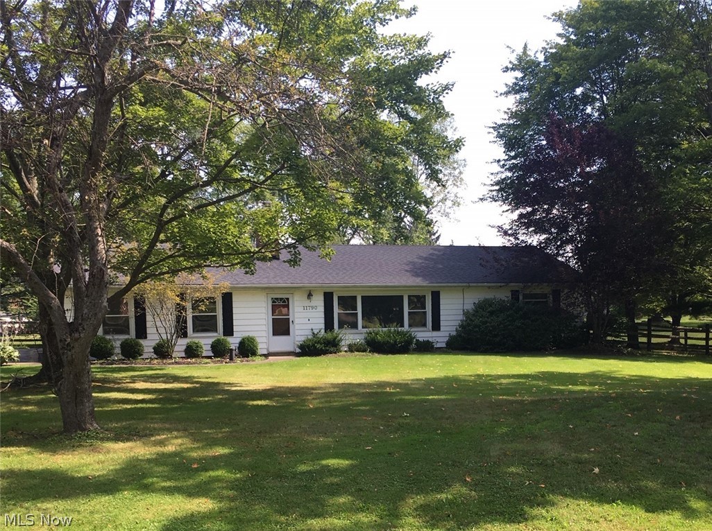Great location - This 3 Bedroom & 2 Full Bath Ranch is set on 1.26 ac! 1700 sqft of living space includes Living Room with fireplace, Family Room, Dining Room open to Kitchen with all appliances. Partially fenced-in yard with small patio. Paved driveway, 2-car attached garage and storage shed. Updated septic system. 1-yr home warranty. Just minutes to schools, parks, freeways, shopping and Chardon Square.