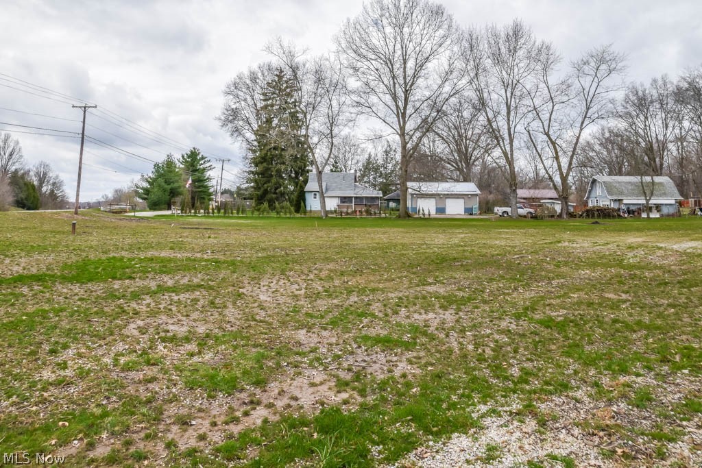 Endless possibilities to build on this 1.18-acre corner lot in Tuslaw schools! With no zoning regulations, this parcel could be the perfect spot for your new home or business.  All utilities are available, including public water tie-in at the street. Great accessibility with frontage on 2 streets, cleared for easy construction, and just minutes from Rte. 30.  Take a look today!