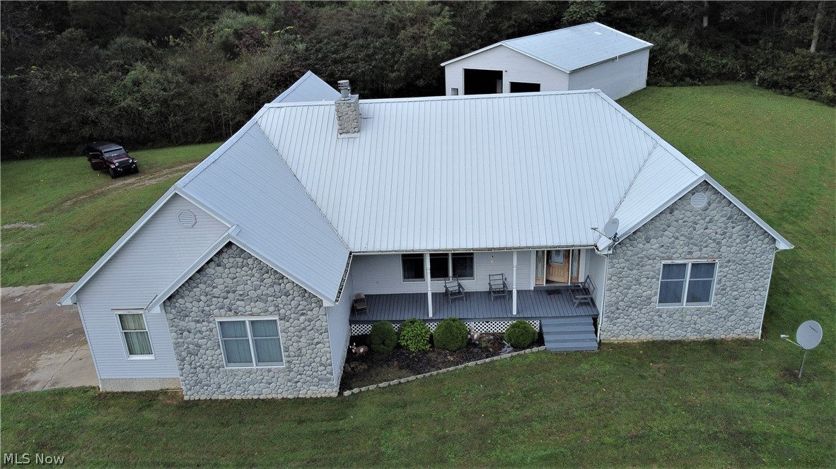 Are you ready for this! A beautiful hilltop setting, Noble Local School district, with 16.51 acres, mineral rights included. This property offers 2001 ranch style home with 2,760 square feet. Four bedrooms, four bathrooms. One side of the home is set up as a mother-in-law suite with its own kitchen, living room, and two bedrooms. There is a stone fireplace in the main living room to enjoy the warmth of those family get togethers. The kitchen has solid oak cabinets and Corian counter tops. Geothermal heat. The Geothermal System was replaced three years ago. Monthly electric and heating bill runs $376 per month on budget. Underground utilities. Poured basement walls, basement is unfinished. There is a fifth room in the basement that could be used for a bedroom. Water softener. Nine foot ceilings throughout the home. There is a jetted bathtub in the master bath and a double sink with Corian counter tops. A 33.08" x 25.04" attached three car garage and a detached 40' x 60' pole barn with a full bath and a special RV discharge pipe for sewer. The pole barn also has a hook up for a wood burning stove. Above ground pool (need liner).