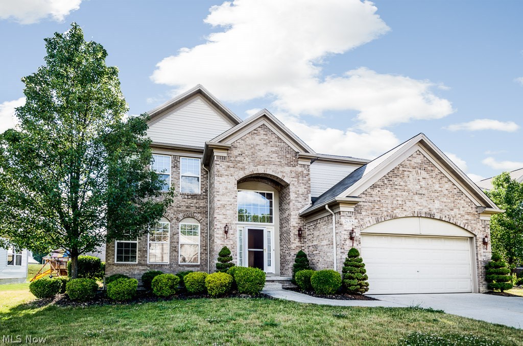 Fantastic opportunity in Bentley Park of Avon! Upon entering this beautiful Brick faced home, you will be greeted by a large 2 story foyer which leads to the spacious Living room, wood floored Family room with gas fireplace and that also carries into the dining room. Enjoy cooking in spacious 19'x19' Eat-In Kitchen with island. The eat-in area has access to backyard patio, awesome for entertaining guests and enjoying summer BBQ's! Four generously sized bedrooms with wood floor are on the second floor, including the Master Bedroom with a fabulous master bathroom that includes a bath tub, stand up shower, Jack And Jill Sink and two separate walk-in closets for his & hers. Another full bath with Jack & Jill Sink. Full basement with partially finished area has a full bath room, kitchen and spacious recreation room, perfect for entertainment! Lots of storage. Minutes to schools, Avon Commons shopping centers & freeway access and Crocker Park nearby. Call today to schedule an appointment!!!