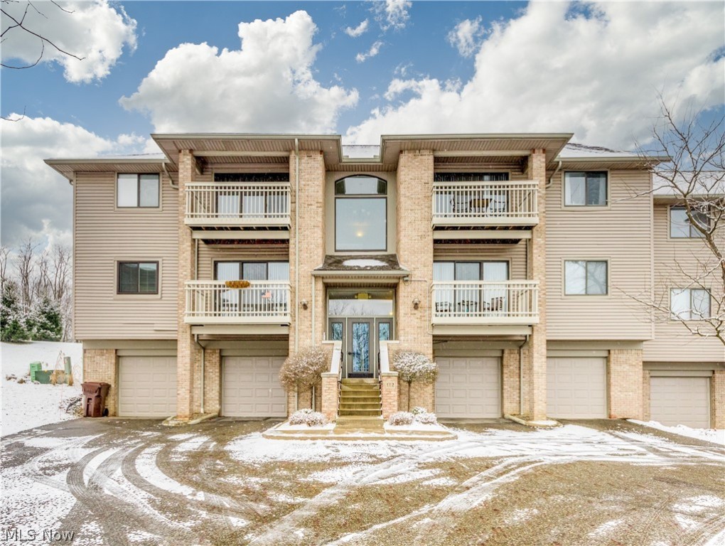 Gorgeous condo (end unit) in the Enclave!  Lots of updates to enjoy and move right in!  Lots of light and green space for privacy.  You will love the updated kitchen with white cabinetry, black stainless appliances, newer carpet, new windows in 2018 (warranty), freshly painted and newer deck boards on back deck.  The seller has contract with a Heating Company to come out every 6 months to check the HVAC. Furnace, A/C and H2O 2007.  The Enclave has exercise room, meeting room, easy access to Interstate 77 and Montrose shopping and dining.