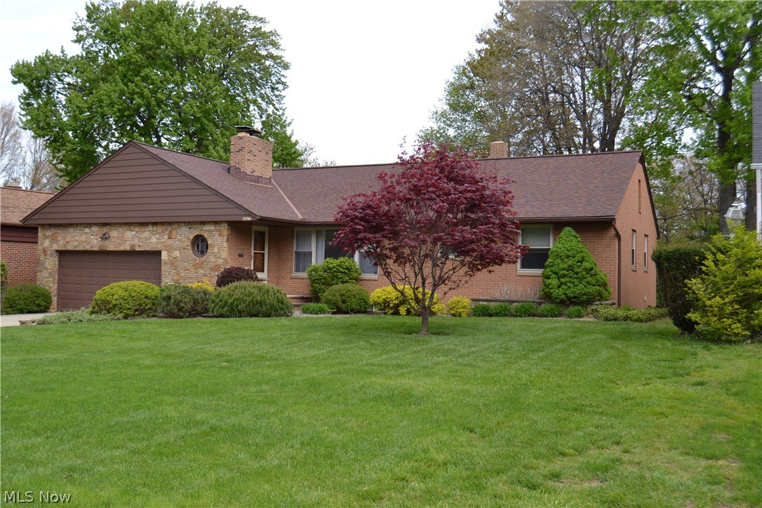 Beautiful brick ranch! This home has it all and more. Giant eat in kitchen (all appliances stay), dining room, sun room, Large living room with lots of natural light with a beautiful brick fireplace, three big bedrooms with gorgeous wood floors and 1 and 1/2 baths on the first floor. The lower level has all the entertaining space you will ever need with a pool table, fireplace, 8 person wet bar and a wine cellar. Welcome Home!