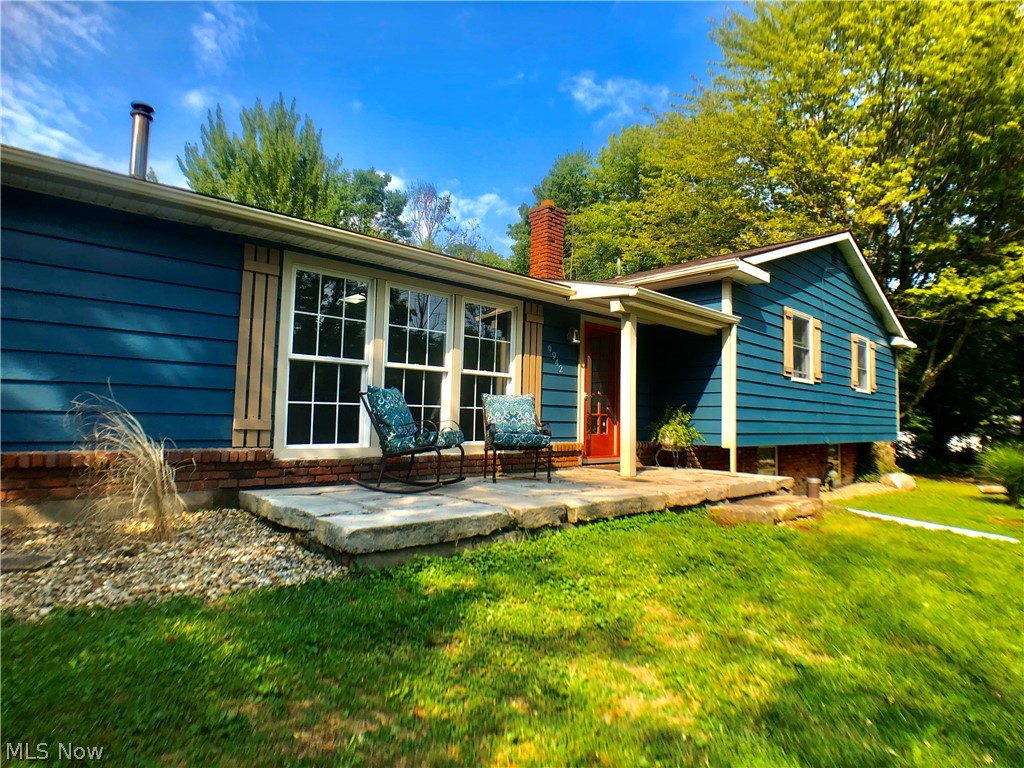 Fantastic remodeled home on over 2 acres just outside of Chagrin Falls! If you're looking for a move in ready and great privacy you have found the right place! Though this home is a split level style the second floor is only 3 steps making it nearly one floor living. Updates include a stylish laminate flooring installed throughout the majority of the living area, Brand New septic already contracted to be installed, New Boiler, New well pump, new hot water tank, updated lighting, farmhouse style kitchen sink, new fixtures throughout the house, the whole house has been repainted and deck stained! Some additional features include custom cabinet set with large island, leaded glass cabinet doors and a finished concrete counter-tops. The skylights and floor to ceiling windows provide a great natural light. Open concept layout allows for plenty of versatility in choosing your finishing touches! Great room has wood stove fireplace. All four bedrooms are large including the Master Bedroom with