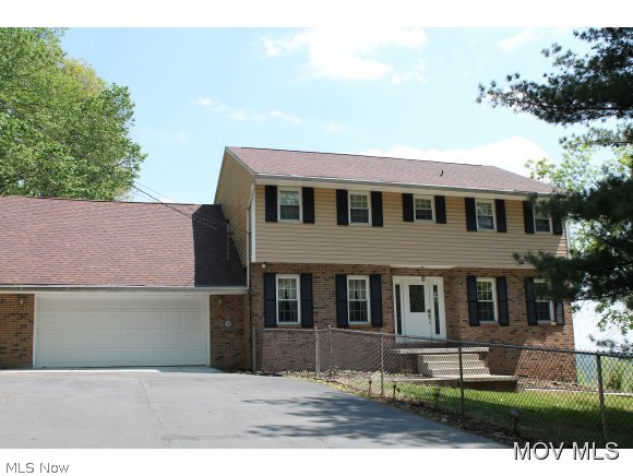 Fabulous, 5 Bedroom, 3 bath home offering panoramic views overlooking the Ohio River,located on a private drive, on the fringe of town. On the main floor a spacious kitchen with breakfast nook features custom cherry cabinetry, Jenn Air appliances and Corian Counters. Adjoining the kitchen is a formal dining room. The Keeping Room is accentuated with a wood burning fireplace. The Living Room boasts a large bay window. The bath on this floor is fully appointed with a soaking tub. The walk out lower level offers a family / game room with bar area and bonus storage.  Elem: Little Hocking Elementary Scho  Elem/Bus: Y  JrHigh: Little Hocking  JrHigh/Bus: Y  High: Warren High School  High/Bus: Y  Fire: VOL  Police: SHF  ;SQFT=Fin L1:1507, Fin L2:1309, Fin Bsmt:728, Fin Above:3535, Fin Total:3544, Unfin L1:0, Unfin L2:0, Unfin Bsmt:350, Unfin Above:350;GAR= 2 Car Att