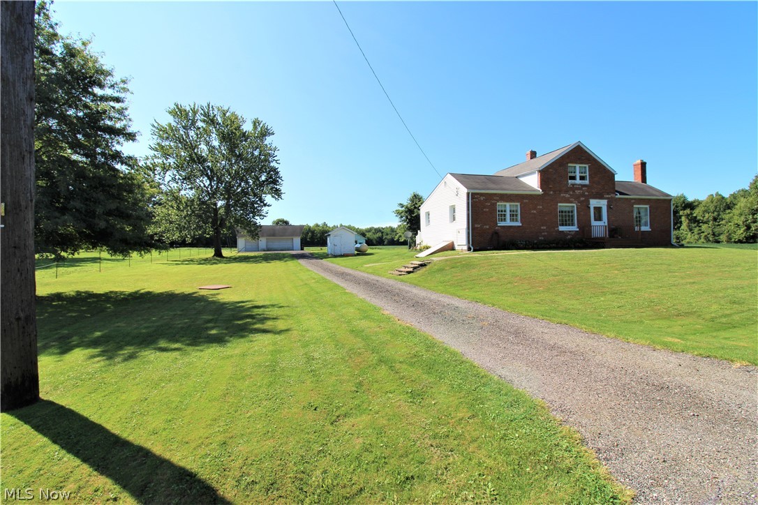 Quaint & Well cared for 3 bedroom 1.5 Bath Bungalow on approximately 4 acres (land is too be surveyed off larger parcel approx. 400 ft frontage by 400ft back) Upon entry in home offers a welcoming cove style room w/coat closet. Warm & Cozy living room with WB fireplace, formal dining room with custom corner wood cabinets and a Large-Bright & Airy Kitchen which includes Heavy Butcher Block Cabinet and propane stove! Desirable first floor Bedroom and Spacious Bathroom!  Upstairs too 2 more nicely sized bedrooms and a water closet. Covered porch/Mudroom at back of home from back entry (used to be a 1st floor laundry which can easily be brought back (220 line there) Downstairs to a Full Basement~walk up area to driveway. Updates to home when these sellers purchased home in 2017 (replaced steel sewer pipes with black vinyl sewer pipes in b/ment, updated electrical box, newer oil furnace w/all ductwork intact (this can be easily hooked back up, sellers heat with a wood stove & taking with th