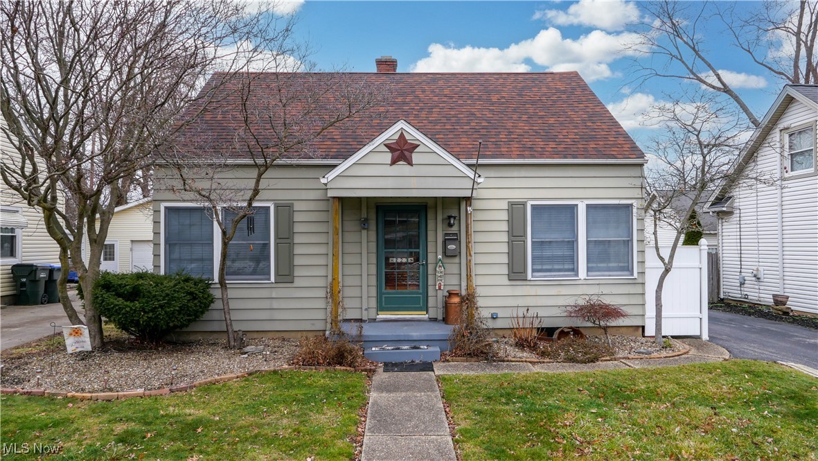 Charming Cape Cod offering 3 bedrooms, 1 full bath, and 1,420 square feet of comfortable living space. The main level features a front living room, two first-floor bedrooms, a full bath, and kitchen with stainless steel appliances and tile backsplash. The dining room flows into a spacious family room highlighted by a wood-burning fireplace and beamed ceiling, perfect for relaxing or entertaining. Upstairs, you’ll find a private third bedroom along with a versatile bonus room ideal for a home office, playroom, or additional storage. The full basement includes a rec room plus a utility/laundry area with the included washer and dryer. Outdoor living features a newer rear deck overlooking a fully fenced, hardscaped backyard complete with a fire pit area. Additional features include a two-car garage with electric, insulated walls, and French door side entry, plus a storage shed conveniently located behind the garage. Recent updates include the roof, furnace, central air, hot water tank, new toilet, carpet, and interior paint. Conveniently located near all that Cuyahoga Falls has to offer.