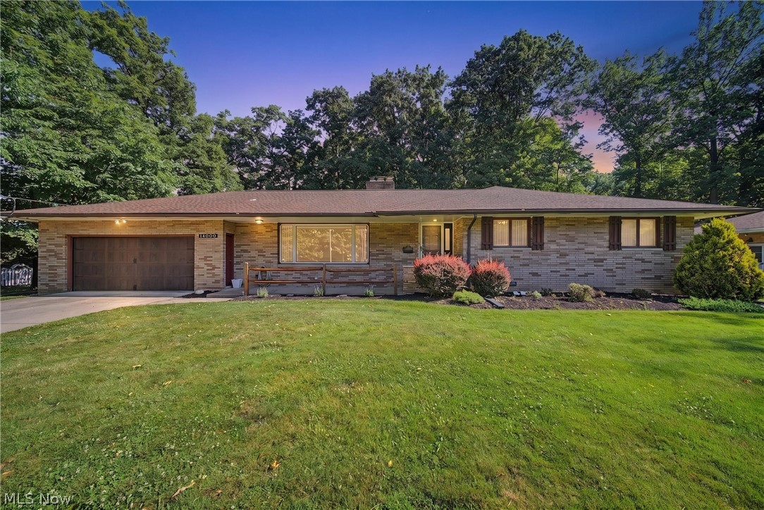 This stunning all-brick ranch truly checks every box! The beautifully updated KraftMaid kitchen comes fully equipped with appliances and opens to a home filled with gorgeous hardwood floors throughout. The spacious owner's suite features a private en-suite bath, while the main level also offers a luxurious glamour bath, convenient first-floor laundry, four bathrooms, central vacuum, and two inviting fireplaces.

The finished lower level is an entertainer's dream, complete with a second fully equipped KraftMaid kitchen, an expansive family room, wet bar, two versatile bonus rooms, a half bath, and even a wine cellar.

Additional highlights include an attached garage with a workshop and a washer and dryer that are less than one year old.

Situated on nearly one acre of beautifully wooded property, this home offers peaceful views of nature and abundant wildlife. The fully fenced, gated backyard provides both privacy and security. Meticulously maintained from top to bottom, this exceptional home is truly move-in ready and reflects A+ pride of ownership throughout!