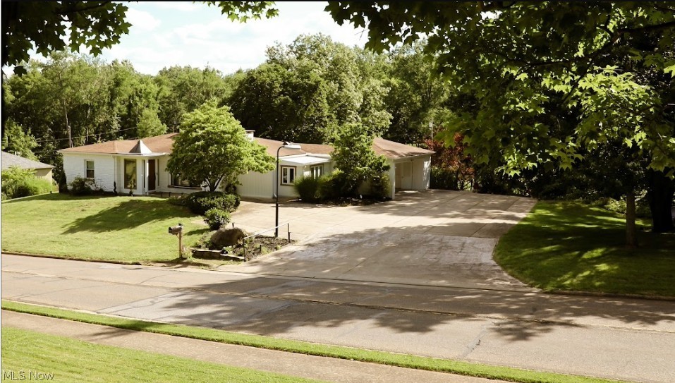 Welcome to 789 Colegate Drive, a truly one-of-a-kind ranch home where timeless architecture meets modern luxury. Completely transformed from top to bottom, every square inch of this residence has been thoughtfully remodeled with exceptional attention to detail and quality craftsmanship.

Offering over 2,700 square feet of finished living space, this stunning 3-bedroom, 2.5-bath home delivers the convenience of single-level living while providing additional finished space in the lower level. The heart of the home is a beautifully redesigned kitchen featuring custom handcrafted wood cabinetry, new appliances, designer lighting, tile backsplash, and premium finishes throughout.

Rich refinished hardwood floors, custom tile work, spa-inspired bathrooms, and carefully curated lighting create an atmosphere of elegance and comfort. The luxurious master suite offers a private retreat complete with a custom tiled shower, soaking tub, and thoughtfully designed finishes.

One of the home’s most distinctive features is the charming sunroom nook—an inviting space perfect for reading, morning coffee, plants, or simply enjoying natural light year-round. Outside, the expansive deck is ideal for entertaining, enhanced by extensive accent lighting, fresh landscaping, and beautifully updated exterior finishes.

Situated in one of Marietta’s most desirable locations, you’ll enjoy easy access to downtown amenities, dining, shopping, and local attractions while returning home to a property that feels both private and refined. Additional highlights include first-floor laundry, walk-in closets, an attached carport, and an additional parking pad for guests.

Homes of this caliber rarely become available. 789 Colegate Drive offers a unique opportunity to own a meticulously renovated residence where no detail has been overlooked.