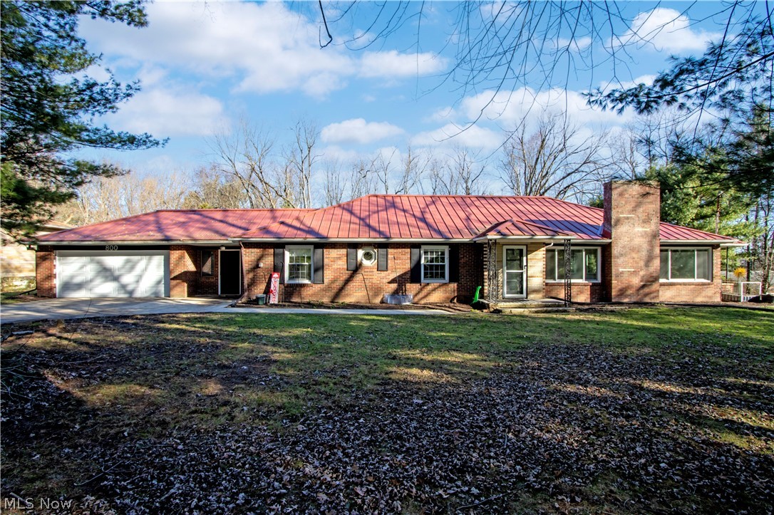 New updates. Fresh improvements. New price. Discover the space, setting, and value this inviting brick ranch now offers! Situated on 1.94 acres with a peaceful country feel and the convenience of village amenities nearby, this home is just minutes from all the outdoor recreation and attractions of the Mohican area. Offering over 2,000 sq ft of main-level living plus a full basement with room to expand, this property delivers flexibility and opportunity. Features include 4 bedrooms, 1 full + 2 half baths, fireplaces, a stunning custom kitchen and beautifully updated full bath, plus continued improvements and fresh paint throughout. Enjoy mature trees, a covered porch, patio, attached 2-car garage with breezeway, storage shed, central air, and recent upgrades. A fresh look, added value, and a new price make this one worth another visit—schedule your showing today!