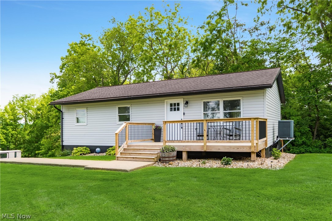 Charming 3-bedroom ranch situated on 1.226 acres in the desirable Franklin Local School District. This updated home offers 2 baths, 3 bedrooms and plenty of outdoor space to enjoy. A spacious 42' x 10' rear deck overlooks a private wooded setting creating the perfect space for relaxing or entertaining. The property also includes a welcoming front deck, attached one car garage and an unfinished basement offering endless possibilities for additional living space, storage, workshop, or recreation area.
