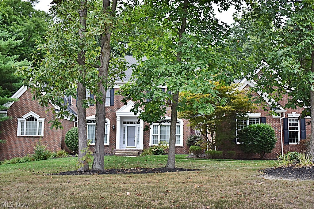 Here's your chance to move into Glencairn Forest for less than appraised value...recently appraised for $1,000,000+!!! Over 7,000SF of living space for $131 p/SF! Step into this stunning colonial and you'll fall in love with your immediate views. 2 Story Foyer with hardwood floors that open to formal living room, formal dining room and the fantastic great room with a wall of windows that provide you views of your private rear yard and custom deck with fireplace. Great room with FP, built-in wet bar and tons of space for large or small gatherings. Study/den is off of great room with 2nd FP! 3rd FP is in the large and open eat-in kitchen also with hardwood floors. Tons of cabinet/counter space, large pantry and another wall of windows/slider that provide more views of that amazing deck! All stainless appliances will stay. Fantastic 1st floor Master BR will become your private retreat...roomy and tranquil w/master bath w/heated floors has double sinks, separate dressing table, large showe