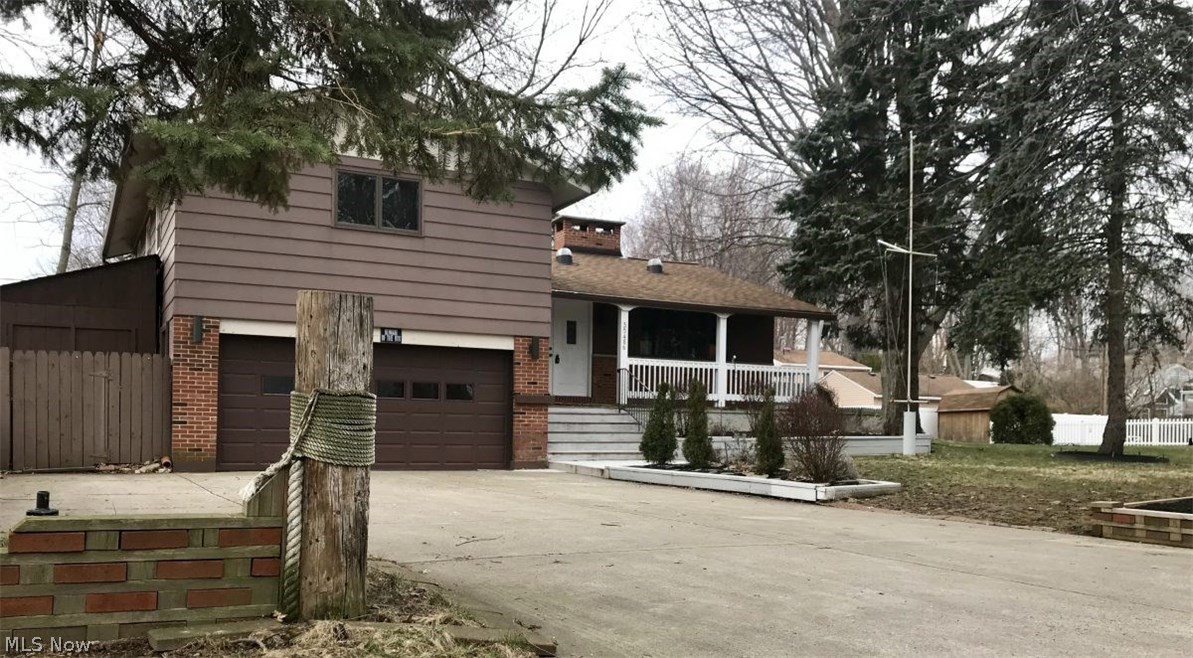 Fabulous Find! Four-level split w/attached garage & over 2000 sf (including LL rec rm). Walking distance to Chagrin Lagoons Yacht Club & near the end of the street with water views! Two parcels included for a total of .4 acres great for outdoor activities/gatherings! This 4 bedroom 2-1/2 bath home has great flow throughout with spacious LR, FR, and rec rm. Master bedroom has private bath (3 bed/2 baths upstairs) and 4th bedroom used as office (on one of the main levels near 1/2 bath). New in 2018: Remodeled kitchen with granite counters, beautiful floor, white cabinets & deep sink, all carpet & fresh paint throughout, furnace, FR roof, re-glazed tub & shower. Many features and other updates include vaulted FR ceiling with 6 Anderson skylights, mostly Anderson windows throughout including beautiful bay window in kitchen, double-sided gas fireplace in LR/kitchen + WBFP in rec rm, hot water tank, Bosch dishwasher, stove, flooring in all bedrooms, tiled garage entry. Plenty of storage, nic