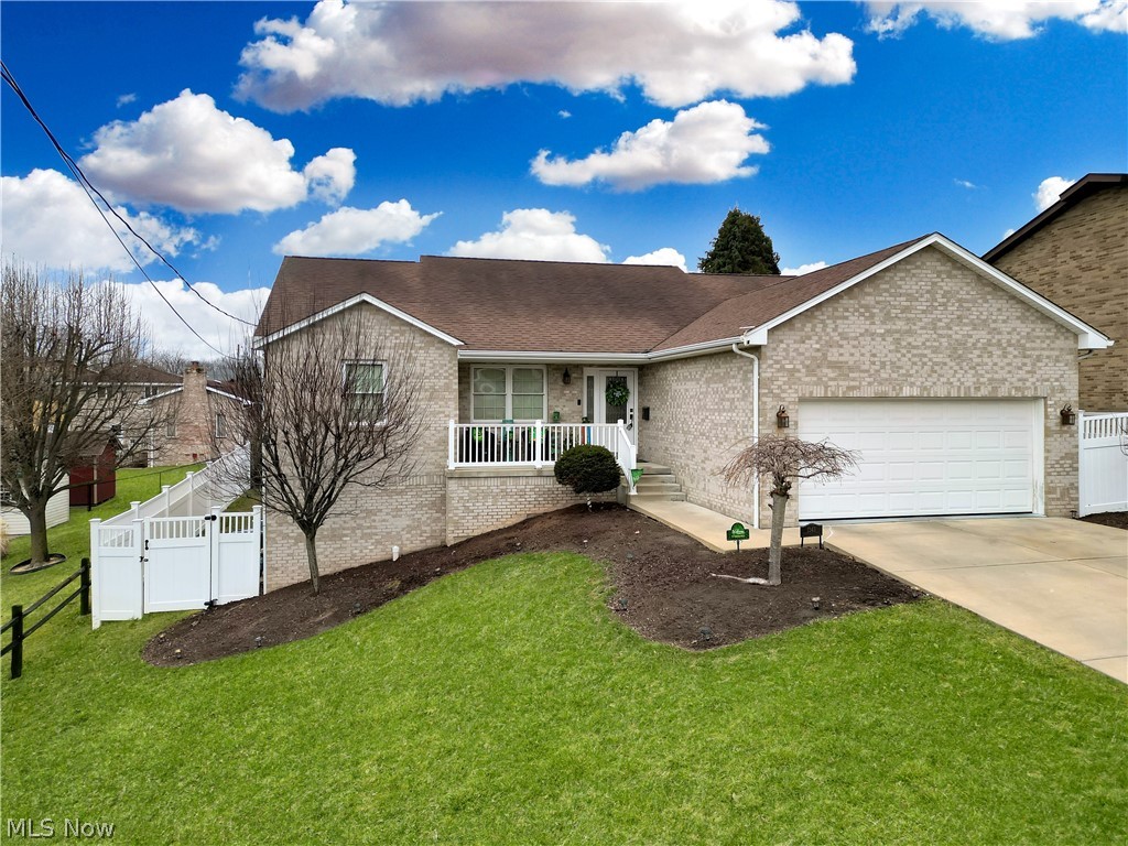 This pristine brick ranch, built in 2010, offers 4 bedrooms and 3 full baths with a modern, open-concept design that feels both welcoming and functional. Upon entering, you’ll immediately notice the maple hardwood floors and vaulted ceilings that enhance the sense of space and natural light throughout the main living area. The kitchen serves as the centerpiece of the home, featuring an impressive 11-foot island, custom cabinetry, quartz countertops, and stainless steel appliances. The open layout flows seamlessly into the living and dining areas and includes walk-out access to the rear deck, making it ideal for entertaining or everyday enjoyment. The primary bedroom provides a private retreat with a spacious walk-in closet and an en-suite bathroom. Two additional bedrooms and a full bath complete the main level. The finished lower level adds exceptional versatility with a massive recreation room, a third full bath, and a fourth bedroom or office—perfect for guests, a home workspace, or additional living space. Outside, enjoy a completely fenced backyard with a low-maintenance vinyl fence, offering privacy and a safe space for pets or outdoor activities. This move-in-ready home combines quality construction, thoughtful design, and timeless finishes in a highly sought-after setting.