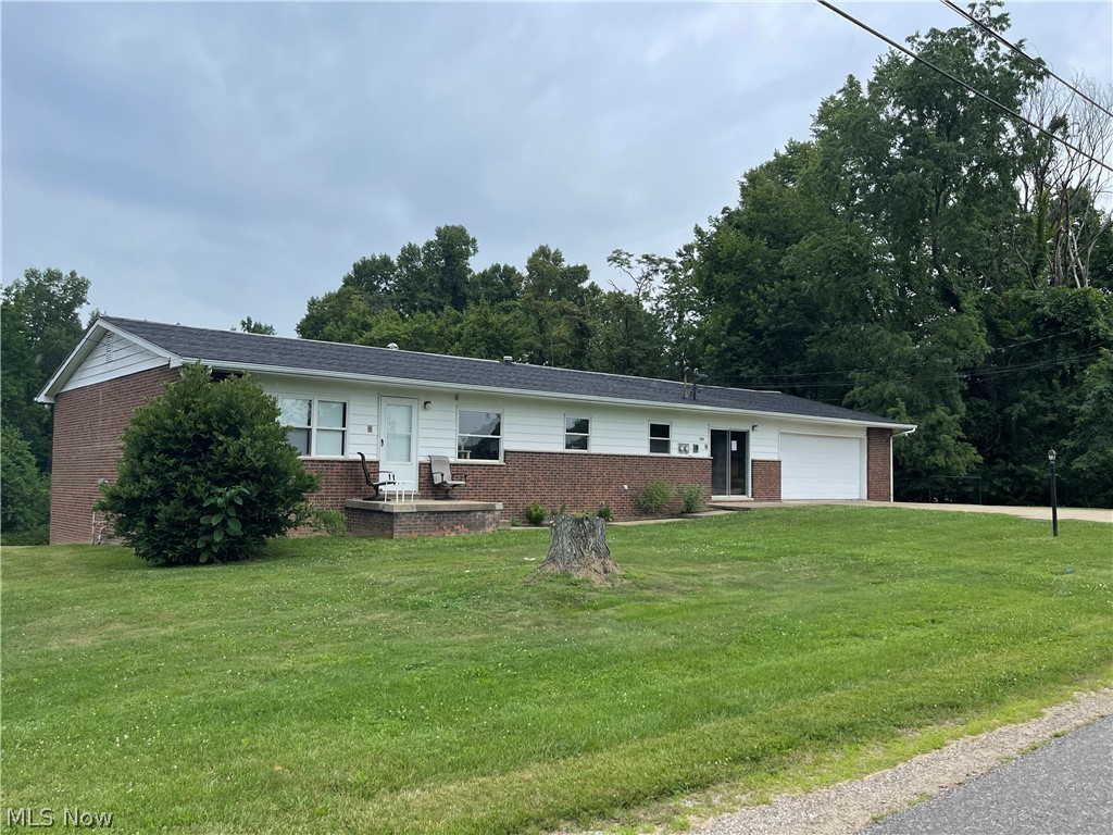 This Brick Ranch on 1-Acre...Has so much potential... This property has been a rental..was rented as 6 bedrooms..Technically it has 4 Bedrooms 3 on the first floor..1 in the basement... Property Has 2-Full Kitchens, 2-laundry areas as well a double car garage space on the first level,, and a 1 car garage on the bottom level.. a corner nesled in the trees back yard!