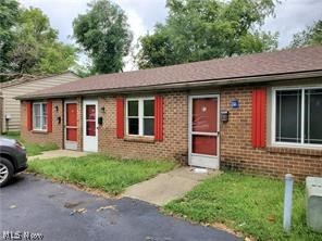 Struthers Ranch style complex with 11 ranch units plenty of parking near your own front door. All brick exteriors with new Roofs. All but this unit is currently rented with good tenants. Includes brand new paint, flooring, trim, updated kitchen and super sharp new bath! Large bedroom with huge closet. Steel front and back doors, screen door, new plumbing and updated electrical wiring and outlets . All electric home means no gas bill, electric paid by tenant. Owner pays EVERYTHING ELSE! Cute sidewalks close to City Hall and Police station, restaurants, shops and bowling alley and Park. Very affordable living.