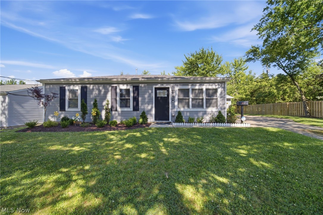 This stunning Medina three-bedroom, one-bath ranch offers the rare opportunity to move into a like-new home with today's most sought-after features --without the wait or expense of new construction. Completely renovated inside and out in 2024, the home includes a new kitchen with island and stainless- steel appliances, new bathroom, bedrooms, open living area along with a new roof, gutters, insulation, plumbing, electrical system, furnace, air conditioning, and a Samsung washer and dryer. The inviting interior features luxury vinyl plank flooring in the kitchen and bath, complemented by premium Dream Weaver carpeting throughout the living areas. A tankless, on-demand water heater provides endless hot water while enhancing energy efficiency. Storage has been thoughtfully planned with a walk-in pantry, built-in wall bookcases with lower storage, and custom closets by Closets by Design -- features buyers want and rarely find. Outdoor living is equally impressive, offering a fully vinyl-fenced backyard, vegetable garden, and expansive concrete patio ideal for entertaining or unwinding at home. Motion-activated floodlights and Ring security cameras add peace of mind. The one-car garage includes a 30-amp RV hookup that also supports electric vehicle charging. Located just minutes from the historic Medina Square, this home provides convenient access to shops, dining, and popular year-round community events. Homes with this level of renovation, functionality, and design features, and location are rarely available. Schedule your showing today!