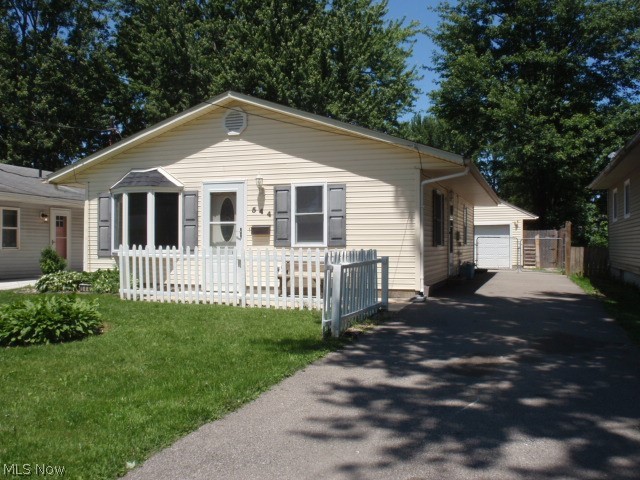 This charming ranch will not disappoint. From the fresh inviting exterior look to the inside all interior rooms have been freshly cleaned and or painted all new carpet, nice lighting, smoke detectors, and CO2 detectors already installed spacious living room with a nice bay window and built-in shelving. The kitchen is not just functional and spacious, but it has a new dishwasher and microwave and the range stays along with the washer and dryer in the utility room. The only thing you need is a refrigerator and you can move right in. 
The driveway is paved, partially fenced off along with the privacy fence in the rear yard and easy access to the two car plus Garage with some shelving newer garage door and it has a door opener. All electric home with the individual room controls and a newer, hot water tank. Don’t wait, if you’re looking for something close to East Rec, or the hospital,  the playground &  schools this one checks all the boxes..