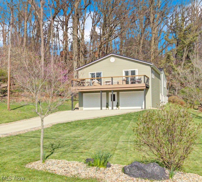 This beautifully updated 4 bedroom, 3 bath home at Lake Mohawk offers year-round lake views and a perfect blend of comfort, style, and functionality. From the moment you arrive, you’ll appreciate the flat, new cement driveway and direct access to a docking area across the street.  
Step inside to discover luxury vinyl flooring throughout the main level and a stylish, updated kitchen that opens to the fenced-in backyard, perfect for everyday living and entertaining. A thoughtfully designed addition has expanded the home to include a spacious main living area with sliding doors that lead out to a composite deck featuring wire and redwood railing—the perfect place to relax and take in the serene lake views.
This addition also includes a stunning main-level ensuite, complete with a walk-in closet, tile walk-in shower, and double sinks with a dedicated vanity area—creating a true private retreat. The main level also offers a dining room, two additional bedrooms, and a full bath, providing both comfort and flexibility.
The finished lower level adds even more living space with a second family room, full bathroom, storage/utility area, and an additional bedroom currently used as a workout room.
Car enthusiasts and hobbyists will appreciate the oversized two-car garage with sleek metal paneling, offering both durability and a modern edge.  
Enjoy all the incredible amenities that Lake Mohawk has to offer, including a private 500-acre lake with unlimited horsepower boating, multiple beaches, marina, clubhouse, tennis and pickleball courts, playgrounds, 9 hole executive golf course, and year-round community events—creating a true resort-style lifestyle.
Seller to retain mineral rights.
Don’t miss your opportunity to own this luxurious lake-view retreat—where every day feels like a getaway!