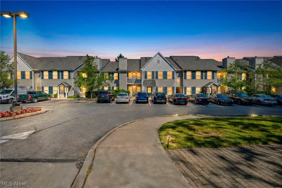 Truly an exceptional & rare find! Beautifully updated 3-bedroom, 2-full-bath ranch-style condo offers the convenience of one-floor living combined w/spacious, open floor plan & is ready for immediate occupancy. Inviting interior is filled w/natural light & enhanced by fresh luxury vinyl plank flooring, creating a warm & welcoming atmosphere throughout. Open-concept kitchen is perfect for entertaining & everyday living, featuring upgraded appliances that are included & seamless views into the main living areas. Spacious great room is highlighted by a cozy gas fireplace, providing the perfect setting for relaxing on chilly evenings. An in-unit laundry room adds convenience, newer washer and dryer included. Impressive owner's suite offers a private retreat w/full bath & large walk-in closet. Two additional bedrooms provide flexibility for guests or home office. Enjoy outdoor living from your private balcony & outdoor seating area, ideal for morning coffee or evening relaxation. Convenient garage provides protected parking and additional storage. Located in a highly desirable community, you'll enjoy easy access to recreation facilities, walking trails, golf, shopping, plus amenities of nearby Crocker Park. Opportunities to own a spacious 3-bedroom ranch condo in this sought-after complex are rare. Beautifully updated, spacious, low-maintenance and move-in ready—don't miss your chance to make this exceptional home yours! Home Warranty Included
