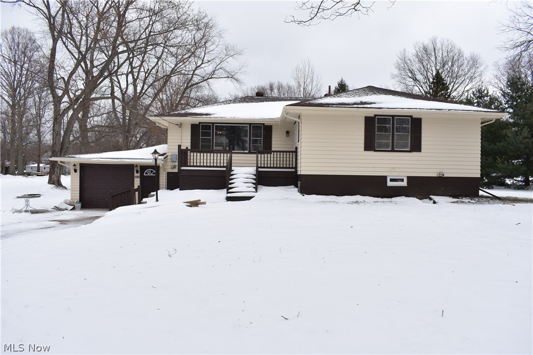 4 Bedroom 2 Full Bath Custom Remodeled home in Saybrook Township! Ranch style with a full Finished basement, 1 car attached garage, central air, generator, whole house air purifier and more. The updates are truly unique and astounding! The main level features refinished hardwood floors, an open concept with the 25'x12' living room connecting to the kitchen via a NY designer-look Venetian archway. The kitchen is a sight to behold with one-of a kind epoxy counter-tops, never used stainless steel appliances just installed this year, porcelain floors with marble accents, and a glass mosaic back-splash. From the kitchen area step down into the Bonus Family Room full of light with a perfect view of the scenic backyard! A large master bedroom offers a private and newly refinished full bathroom. Both bathrooms in this home have a tiled bathtub surround, newer vanities, lighting, and tile floors. The Full Finished basement offers a 5th Bedroom! There is so much space in the basement & so many p