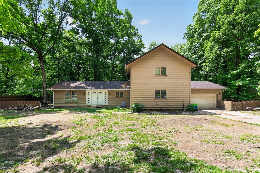 Take a look at this massive house on a quiet street in Plalan Lakes! Big enough for any large family. The kitchen has chocolate cabinets, beautiful white countertops, and all stainless steel appliances. The bathrooms have tile flooring and a white vanities. The dining room has hardwood flooring and French doors and could also be used as a 5th bedroom. The living room has hardwood flooring and is large enough for the whole family. The foyer is very large and could double as a play area for kids. The bedrooms are all very spacious. The attached garage is perfect for keeping your vehicle out of the weather elements, is big enough to hold vehicles, have an area for tools and a workspace. The Furnace is new in 2024 and the AC is new in 2025. With a few simple updates, this large house would be immaculate. Come and make this your new home today!