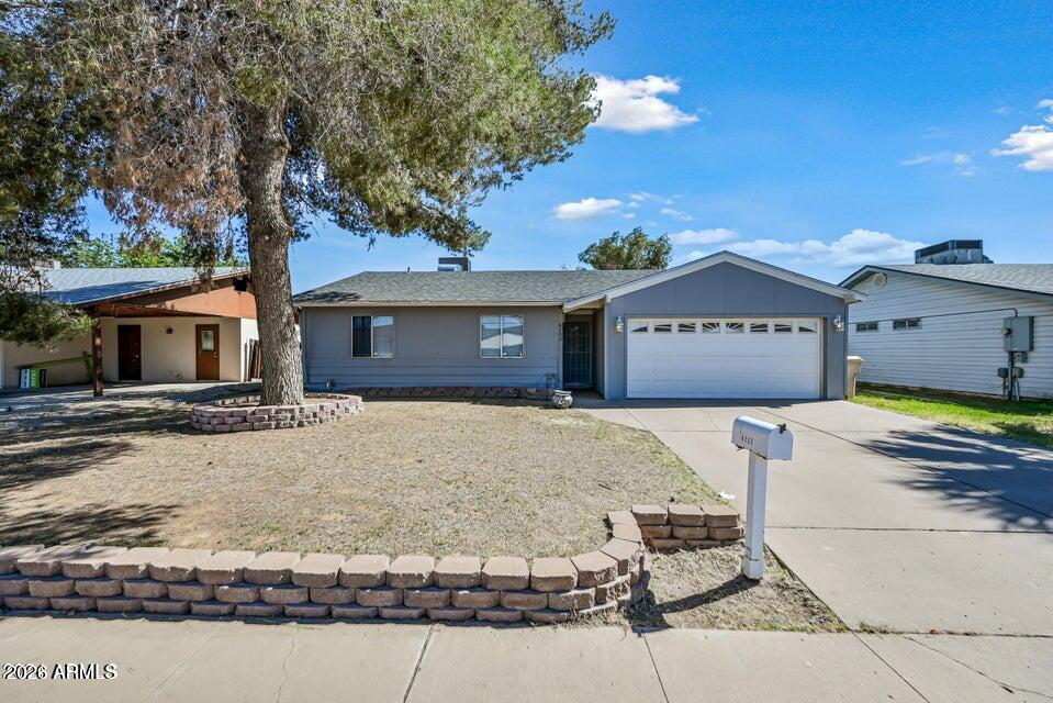 Beautifully updated 3 bedroom 2 bath home with ample living space! There are so many different options in this home with its great layout! There is beautiful laminate floor throughout (NO carpet), the bathrooms have been fully updated and have an amazing modern touch that feels warm and inviting! The kitchen has beautiful dove grey cabinets with stainless steel appliances and endless quartz counter-top space to spread out your cooking supplies! There is flex space in the back of the house that would be perfect for a play room for your children or an extra space to expand your living area. Come see this beautiful home today!