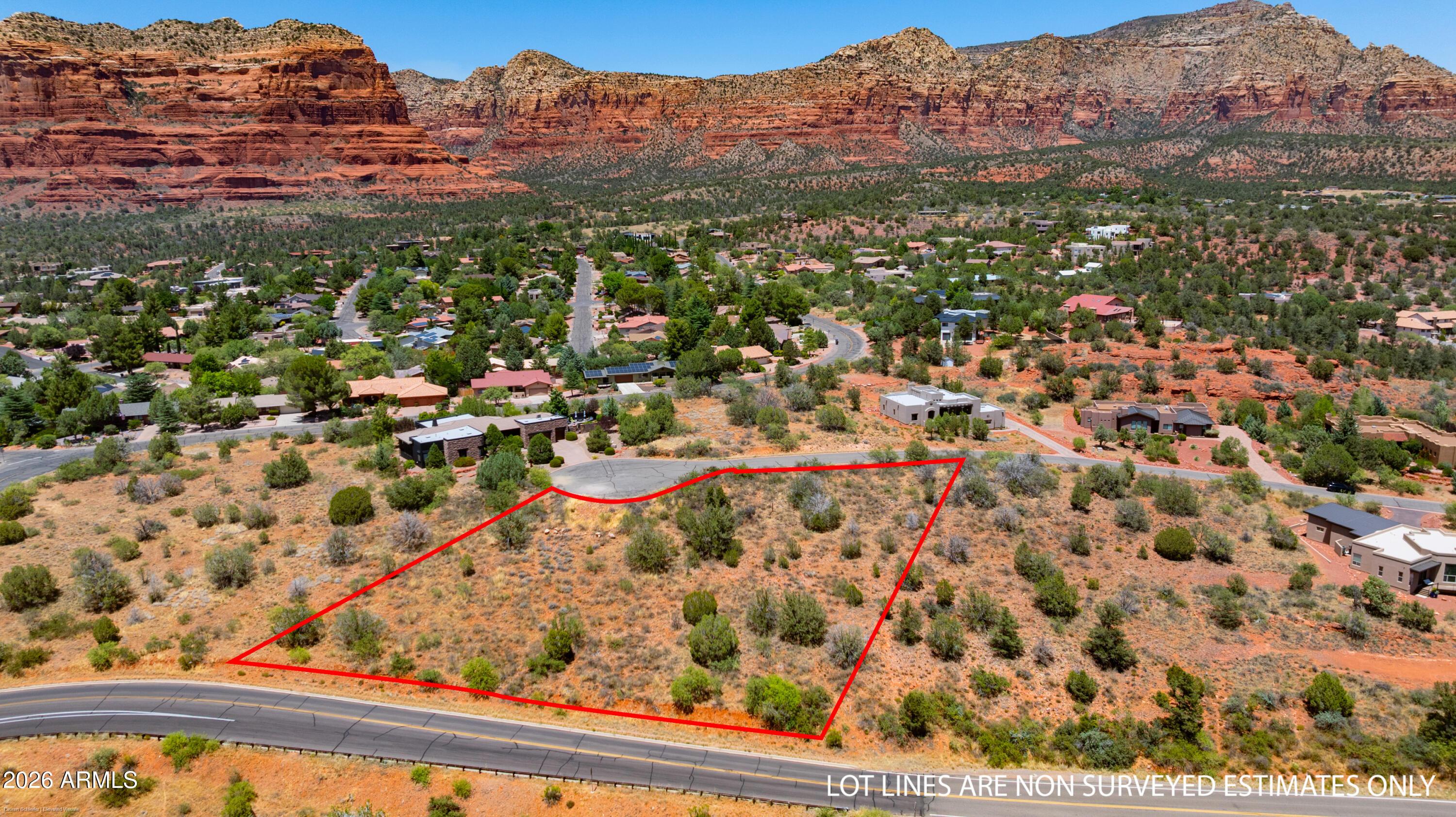 Here is your opportunity to own a full acre in the highly desirable La Barranca subdivision, featuring dramatic, unobstructed views of the majestic Mogollon Rim and expansive red rock vistas that define Sedona living. This gently sloping homesite offers the perfect canvas to create your custom dream home while enjoying the privacy, space, and beauty of acre living.
Utilities are conveniently available at the lot line, including sewer, water, and electricity, making the building process that much easier. La Barranca's thoughtful architectural guidelines help preserve the beauty, quality, and long-term value of the community. Homes require a minimum of 2,200 square feet of livable space, creating an upscale neighborhood of distinctive custom residences.With low HOA dues of just $110 per quarter, this exceptional property offers outstanding value in one of Sedona's most desirable neighborhoods.  Dreaming of making Sedona home? Ready to build the custom home you've always envisioned? Bring your architect, your imagination, and your dreams--the views are already here!