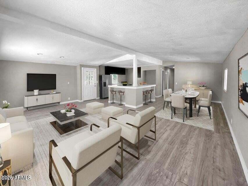 OFFERED UNDER APPRAISED VALUE! Convenienthy located with easy access to both the I-10 and the Salome Hwy. Featuring an open concept with vaulted ceiings, this recently renovated home may just be what you are looking for. With a lot of over 60,000 sq ft, you'll have all the space you need for any of your projects. Both front and back doors lead to a covered concrete patio. Gravel and a variety of trees have been added for appeal. This is your opportunity to own a piece of a rapidly growing area like is Tonopah.