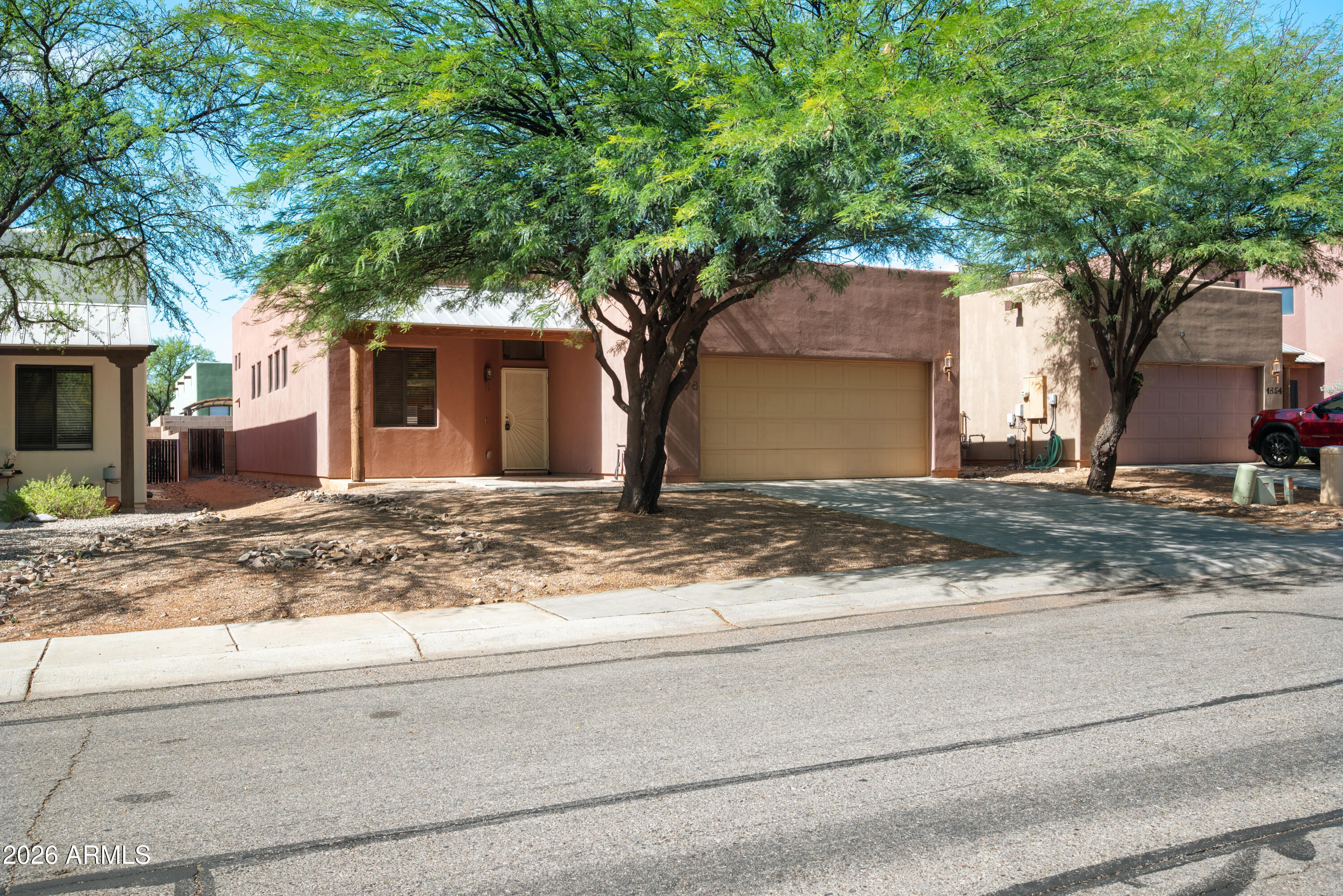 THIS IS IT!  Great 3 bedroom + Den home in a popular neighborhood near the police station and library, plus easy access to the bypass to get to Ft. Huachuca.  Centrally located and in good condition.  Split bedroom floorplan, large living room/great room area.  Spacious master bedroom with attached bathroom that has a stand up shower and walk in closet.  Nice backyard has lots of space.  Home Starts Here.