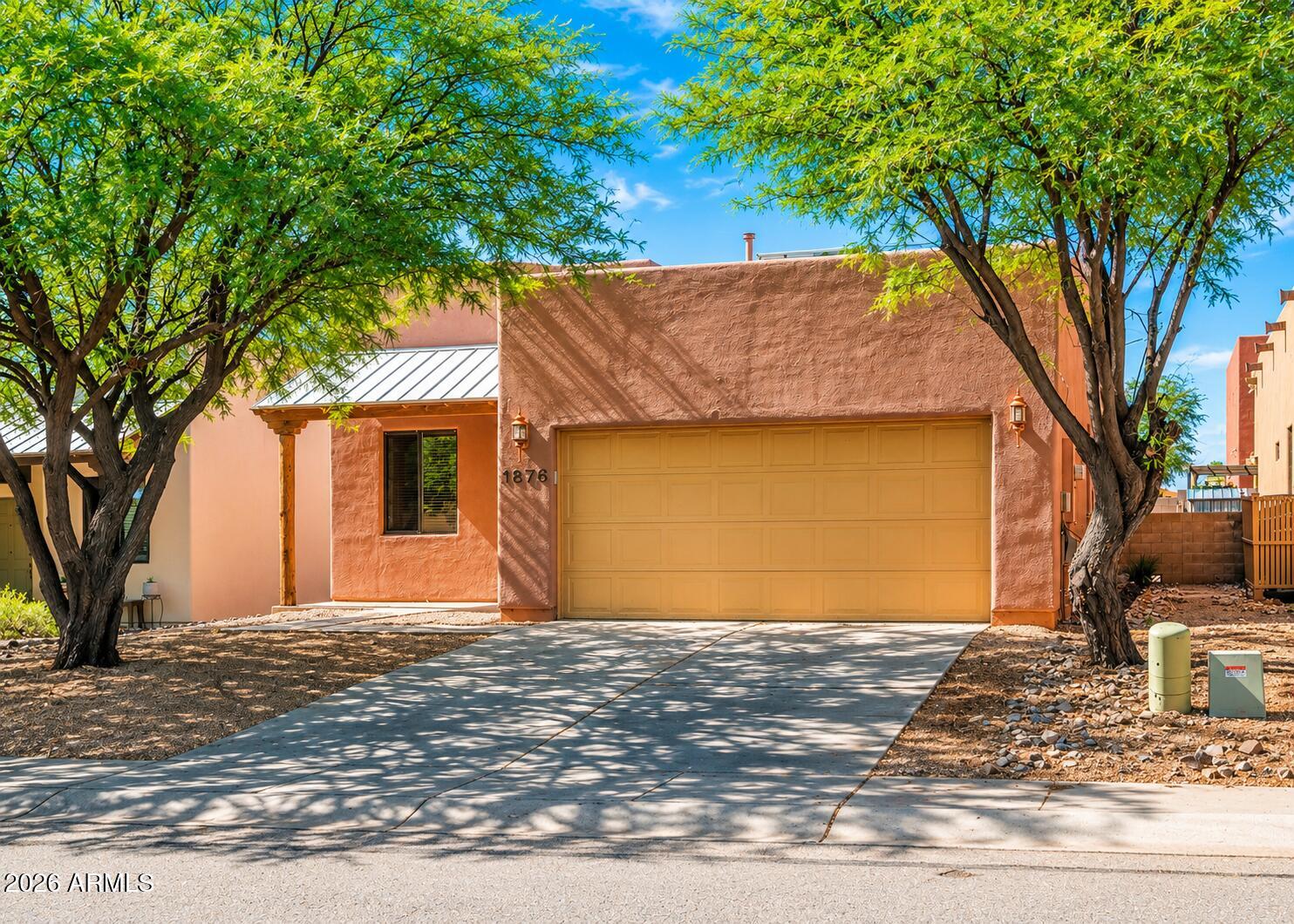 THIS IS IT!  Great 3 bedroom + Den home in a popular neighborhood near the police station and library, plus easy access to the bypass to get to Ft. Huachuca.  Centrally located and in good condition.  Split bedroom floorplan, large living room/great room area.  Spacious master bedroom with attached bathroom that has a stand up shower and walk in closet.  Nice backyard has lots of space.  Home Starts Here.
