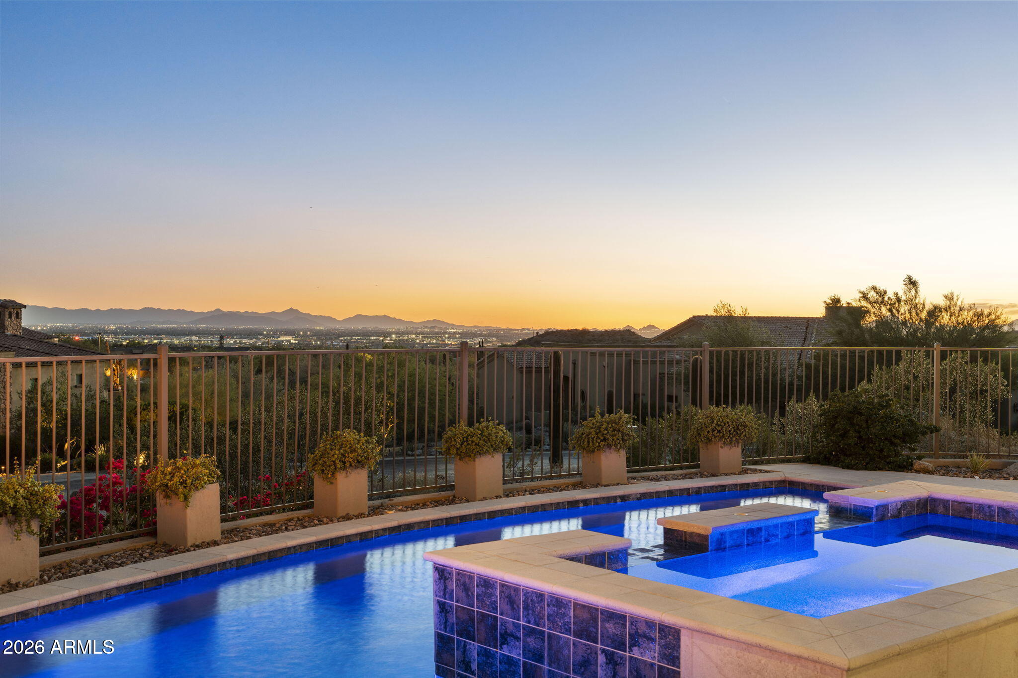 Exceptional Las Sendas custom home with luxury finishes, custom details & fabulous views!  Built in 2019, this beautiful residence is better than new and sits on a .62 acre lot in Las Sendas with sunset, city light and mountain views. An incredible chef's kitchen is built for entertaining and features Wolf appliances, a huge island, double stacked cabinets & quartz counters. The thoughtfully designed great room features a limestone fireplace and wall of glass that opens to the large covered patio. The resort backyard features an outdoor kitchen, heated pool & spa, water & fire features & putting green. This home will tick every box with the 4-car garage (with an air conditioned workshop), custom closets, foam insulation, huge guest suite, office, & spacious laundry room.  Move-in ready! The award-winning golf community of Las Sendas features hiking and mountain biking trails, two pools, tennis and pickleball courts, community parks, lifestyle activities, and a private gym. Located just minutes to the 202 Freeway, and twenty minutes to Scottsdale, Downtown Gilbert, Sky Harbor Airport, and Phoenix-Mesa Gateway Airport this is a truly exceptional property!