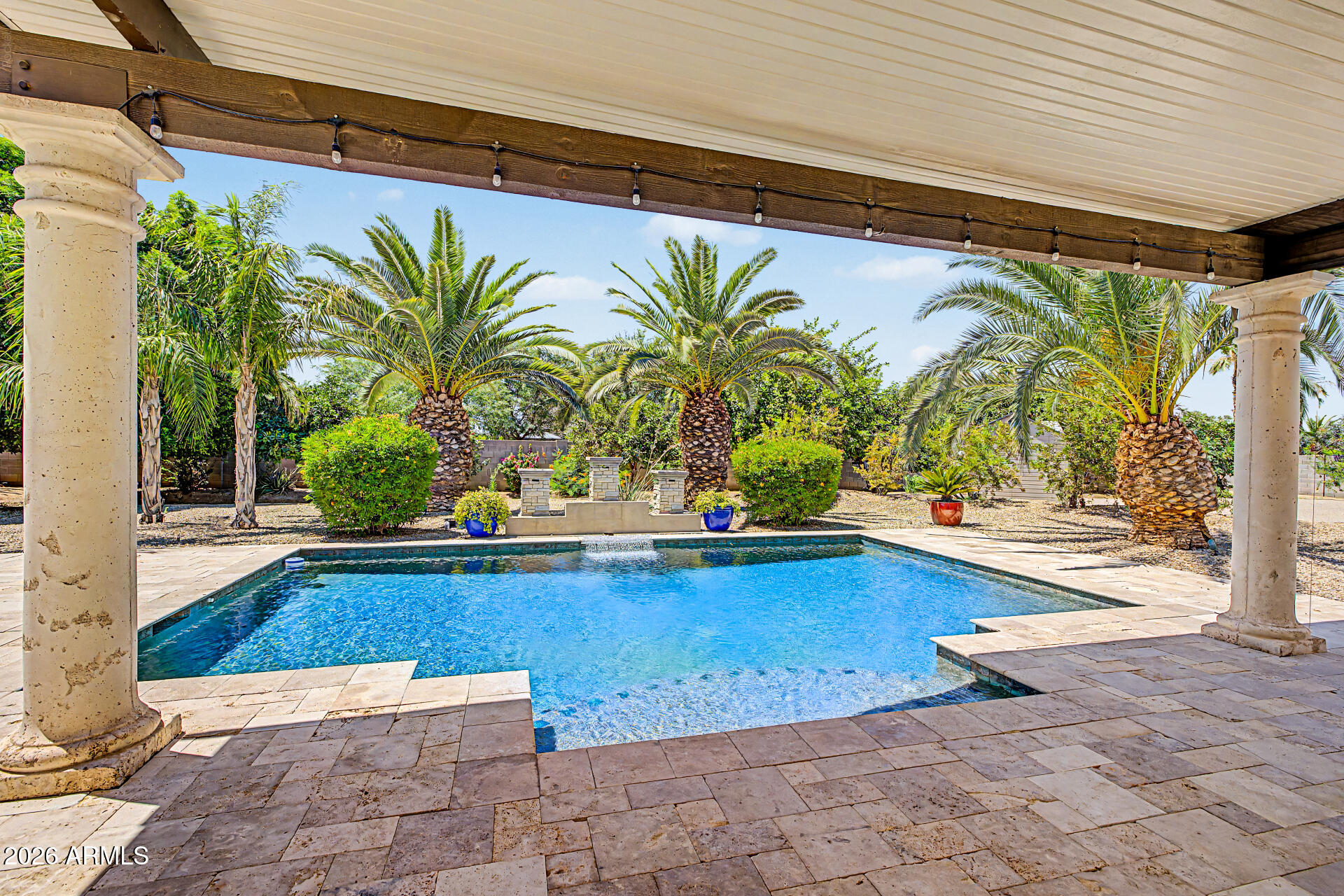 THIS IS YOUR DREAM HOME! THIS IS A BIG BEAUTIFUL 3,500+ SQUARE FOOT, SINGLE LEVEL CUSTOM HOME WITH 12-FOOT CEILINGS ON A BIG BEAUTIFUL 36,000+ SQUARE FOOT LOT IN GILBERT, AZ. FEATURING 7-CAR GARAGE, 12-FOOT WIDE RV GATE, HUGE RV GARAGE, AND PREMIUM PEBBLE-TECH POOL WITH SHADY GAZEBO, WITH A BIG BACKYARD, BIG ENOUGH TO BUILD AN ADDITIONAL GUEST HOUSE. Every feature in this Big Beautiful Home is Premium Quality, including Travertine Flooring in all of the primary living areas and kitchen, Premium 48-inch Tall, 15-inch Cabinetry, Granite Countertops, High-end Appliances. You will love the Open Floorplan with Panoramic Windows that provide Amazing Views of the Big Beautiful Pool with the Green Backyard with lush landscaping featuring a variety of fruit trees. And your water bill will be just pennies because this Big Beautiful Custom Home Lot has irrigation water grandfathered in at just approximately 7 cents per gallon. This Amazing Home will not last long because this home is a "Dream Come True" for those pursuing "The American Dream."