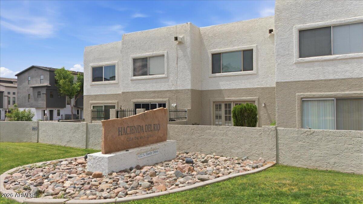 Experience the best of Tempe living in this stylish townhome just minutes from ASU, Tempe Town Lake, Mill Ave, and the city's most vibrant dining, culture, and outdoor spaces. Thoughtfully designed for comfort and convenience, the open great-room layout creates an inviting flow from the living area to the dining space and kitchen, with natural light enhancing the home's warm, modern feel. Sliding doors lead to a private fenced patio--perfect for morning coffee, weekend lounging, or hosting friends before a night out on Mill.

Upstairs, two generously sized bedrooms offer flexibility for roommates, guests, or a dedicated work-from-home setup. The community features a sparkling pool, mature landscaping, and well-maintained common areas that elevate the overall lifestyle experience. With assigned covered parking, quick access to the 202/10/143, and endless recreation just outside your door, this home delivers the ideal blend of location, comfort, and long-term value in one of Tempe's most sought-after neighborhoods.
