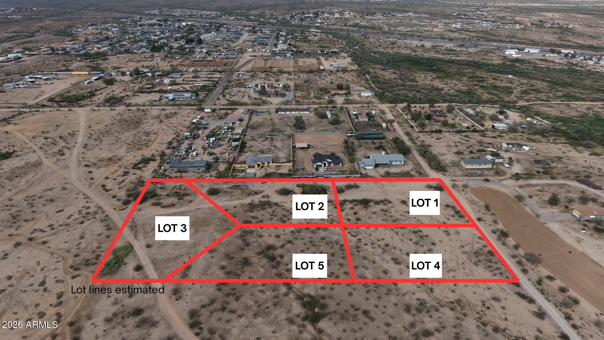 Prime vacant land opportunity in the growing Wittmann, AZ area. This 100% usable property offers 5 level acres already subdivided into 1-acre lots, ideal for residential development or investment. Access to West Gate Community Water is available off 215th Street, reducing upfront infrastructure costs. Electricity available. No flood zone. Flat terrain with easy access. Horses allowed, no HOA. Located near expanding businesses and just minutes from Interstate 303, providing convenient connectivity to the Valley. A rare chance to secure developable land in a rapidly growing corridor with strong future potential. FIVE Tax Parcels included: 50336004U-Y.