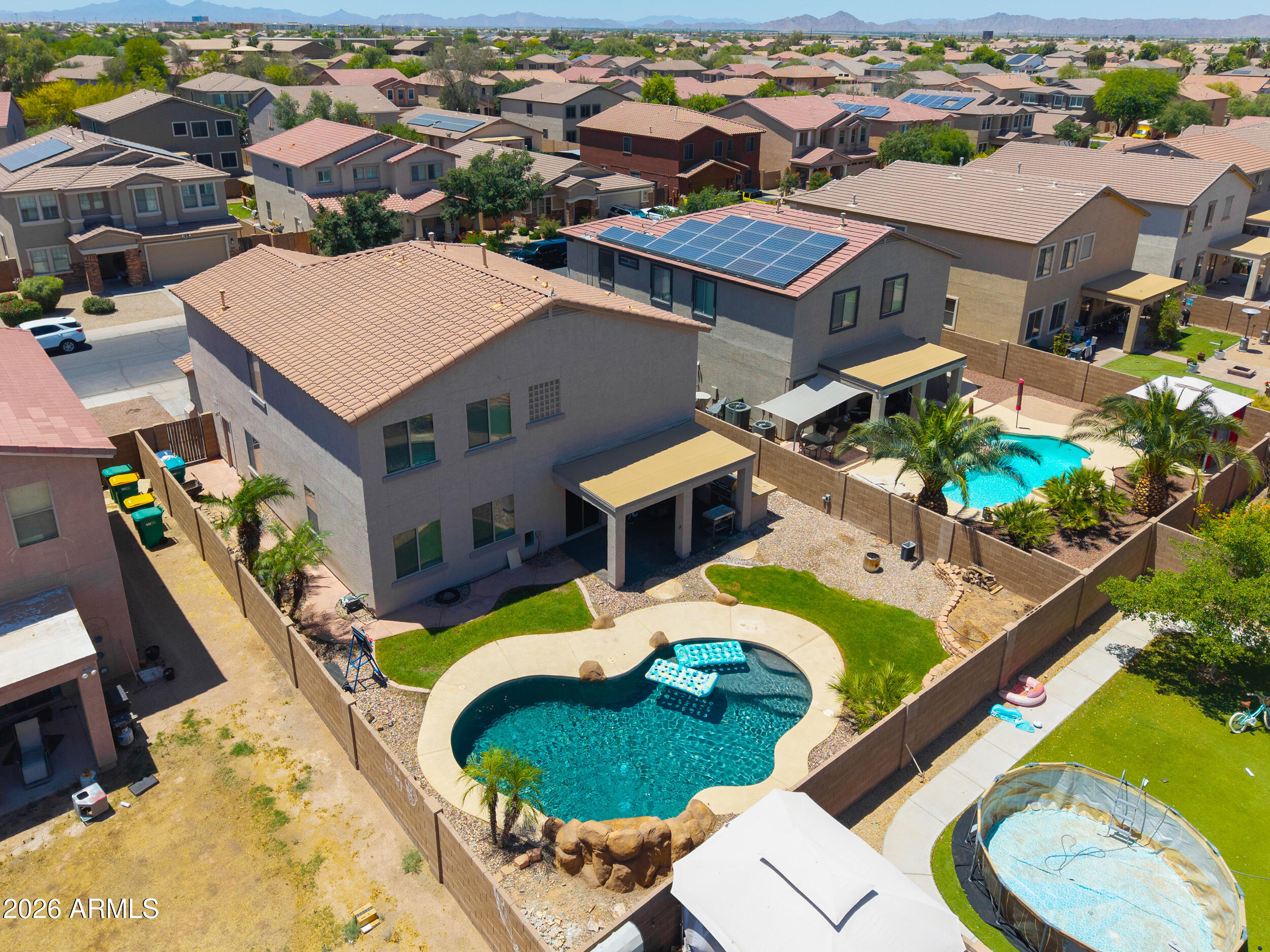 Check out this gorgeous two-story home with a sparkling pool! Move-in ready 5-bedroom, 3-bath home in the desirable Villages at Rancho El Dorado! Offering over 3,000 sq ft of living space, this spacious home features an open floor plan with one bedroom and full bath downstairs--perfect for guests or multigenerational living. Beautiful, engineered hardwood floors, elegant arched passageways, and large windows create a warm and inviting atmosphere throughout. The kitchen includes an RO system and opens seamlessly to the main living areas, ideal for entertaining. Step outside to your private backyard oasis complete with a sparkling pool and waterfall, built-in BBQ, and plenty of space to relax or host. Located in a great neighborhood close to parks, schools, and amenities. Pool table Conveys!