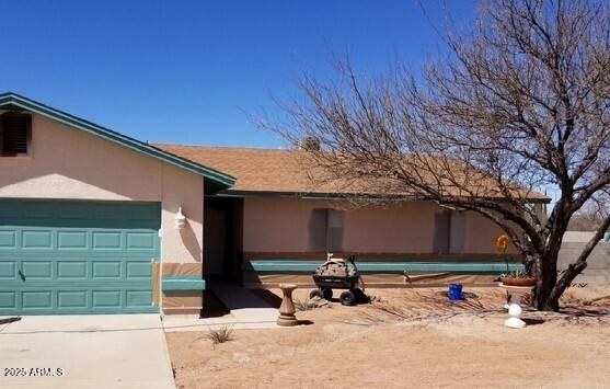GREAT LOCATION! Just two blocks from Allen Street and the Tombstone Historic District, this property is within easy walking distance of the iconic western town famously known as ''the town too tough to die.'' Enjoy unique shops, local dining, and nearby attractions right at your doorstep.
Situated on two parcels and fully enclosed with a block wall, the property offers ample space for RV parking. The backyard features a large shop with electricity, perfect for hobbies, storage, or projects. Experience the charm and excitement of Tombstone as the stagecoach drives by!