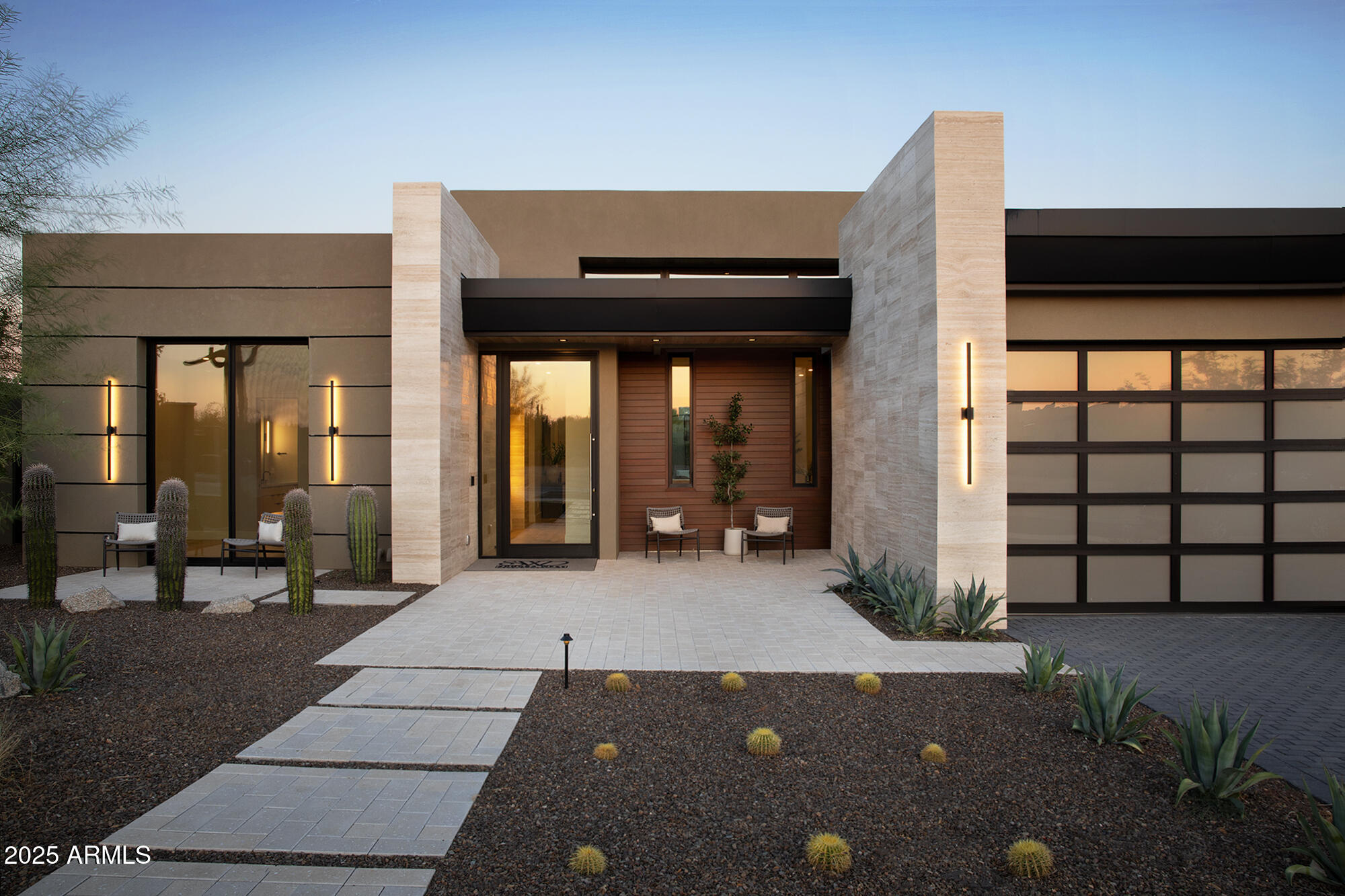 Serene Model B has 3,290/sf with interior design by EST EST designers with lavish finishes including Travertine tiled walls, double sided see through fireplace, double island kitchen, wood flooring throughout, white oak tongue and groove ceiling in the Great room and primary suite, posh primary suite with spa like back and Appliances by Sub-Zero, & Wolf. The backyard includes a stunning pool with a 360 degree negative edge spa, fire pit and BBQ.  Also included is a 3 car tandem garage, fully landscaped yard. Serene is Located on the North East side of Pinnacle Peak in North Scottsdale. Serene is close to  shopping, restaurants and over two dozen private and public golf courses. Don't miss your opportunity to take part in the Serene lifestyle. Photos are of same model different house.